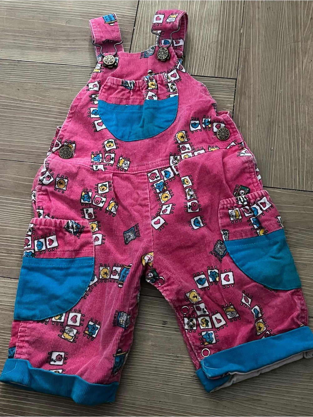 Girls' Pink Corduroy Overalls with Bright Blue Pockets - Playful Print
